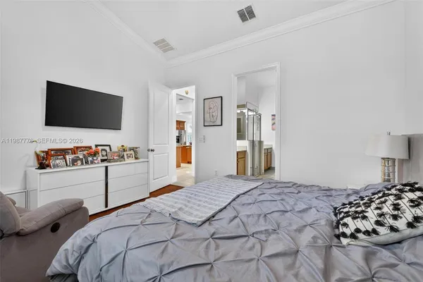a spacious bathroom with a double vanity sink and a mirror