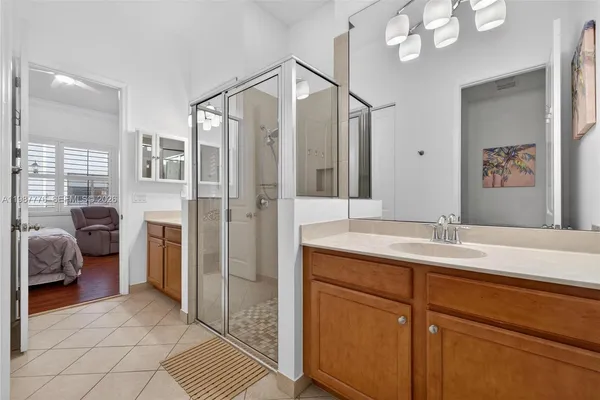 a spacious bathroom with a toilet and a shower