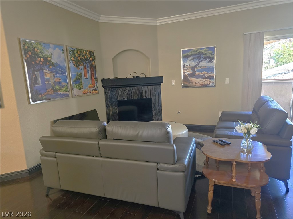 2050 West Warm Springs Road, Unit 2422 Henderson, NV 89014 - Photo 7 of 44 This inviting space features rich flooring, an elegant fireplace, and ample natural light.