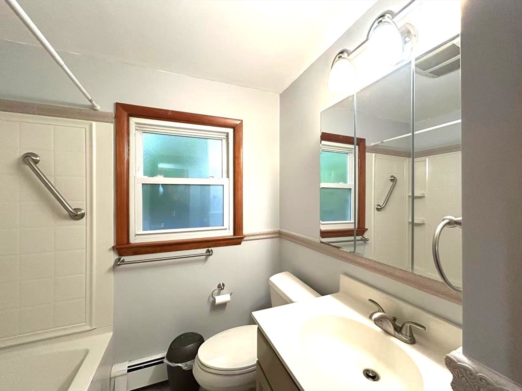 122 Running Brook Road Boston, MA 02132 - Photo 12 of 21 a bathroom with a sink toilet and shower