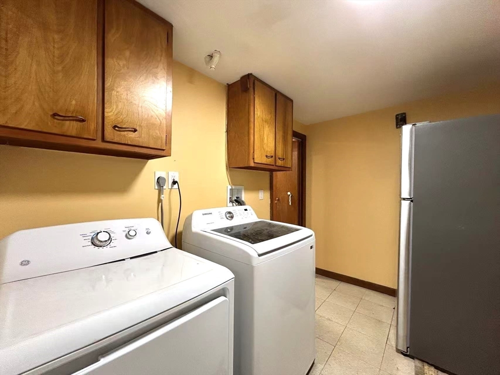 122 Running Brook Road Boston, MA 02132 - Photo 20 of 21 a utility room with dryer and washer