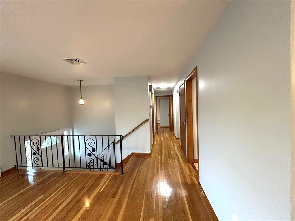 122 Running Brook Road Boston, MA 02132 - Photo 6 of 21 a view of entryway with wooden floor