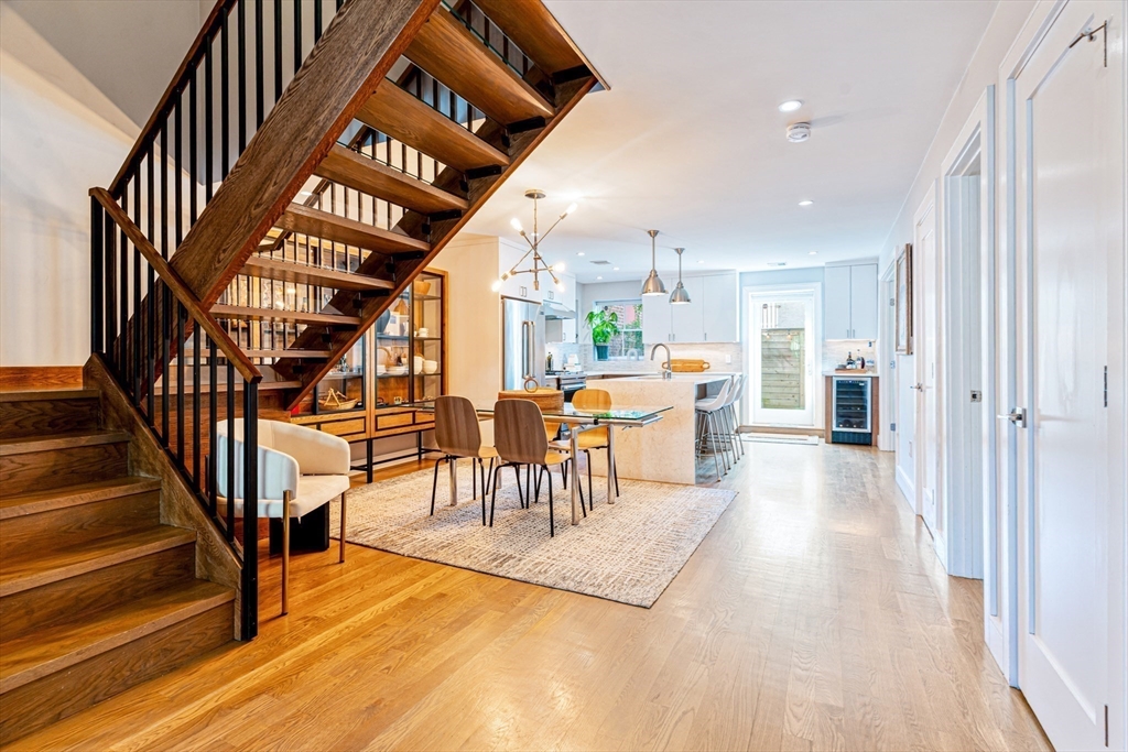 491 Massachusetts Avenue, Unit 1 Boston, MA 02118 - Photo 1 of 26 a view of a living room and entryway with furniture