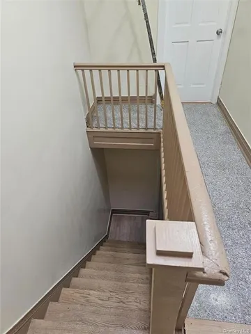 a kitchen with stainless steel appliances granite countertop a sink and a stove top oven