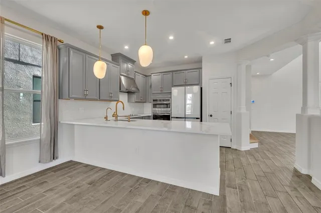 a view of a swimming pool with a garden