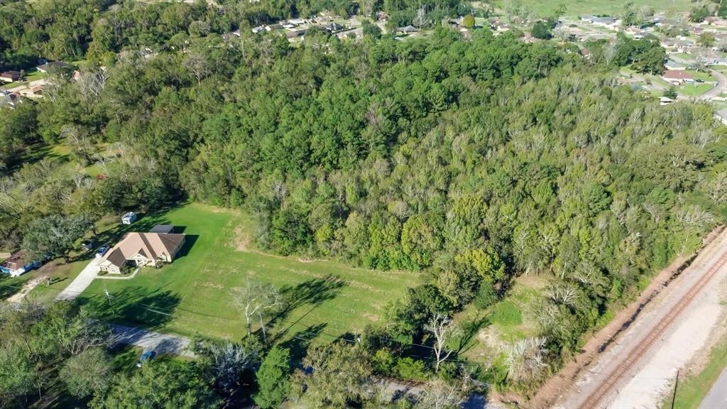 0 Garner Road Beaumont, TX 77708 - Photo 2 of 4 an aerial view of residential house with outdoor space and trees all around