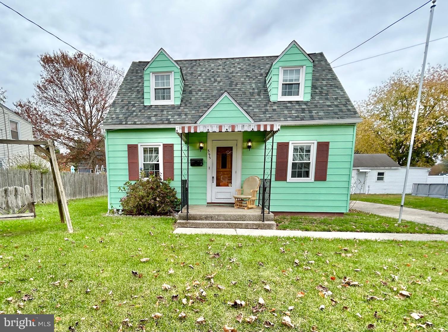 393 Manor Avenue Carneys Point, NJ 08069 - Photo 12 of 43 Charming green cottage with an inviting porch.