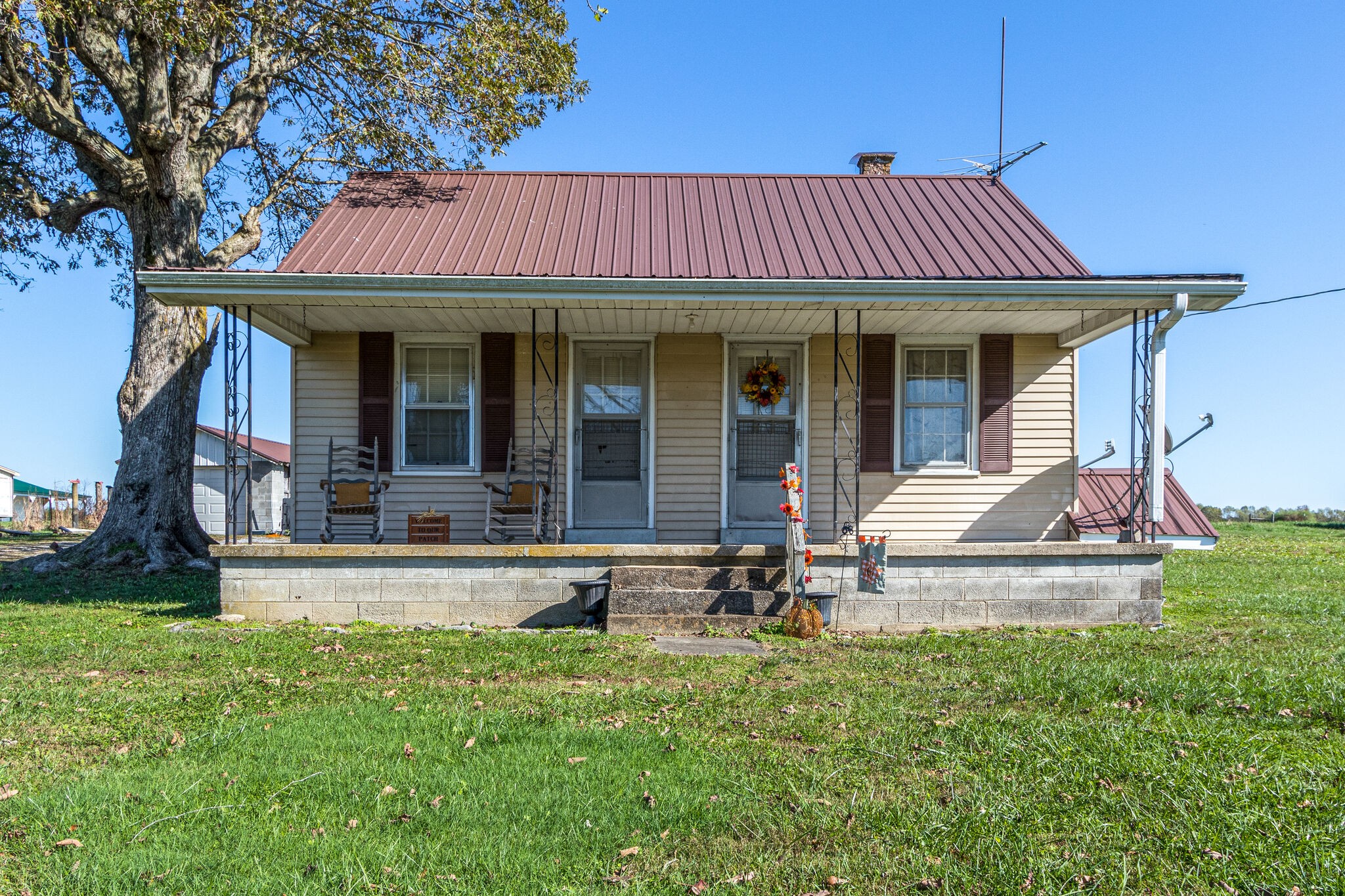 8026 Fredonia Road Manchester, TN 37355 - Photo 2 of 26 a view of a house with a yard porch and furniture