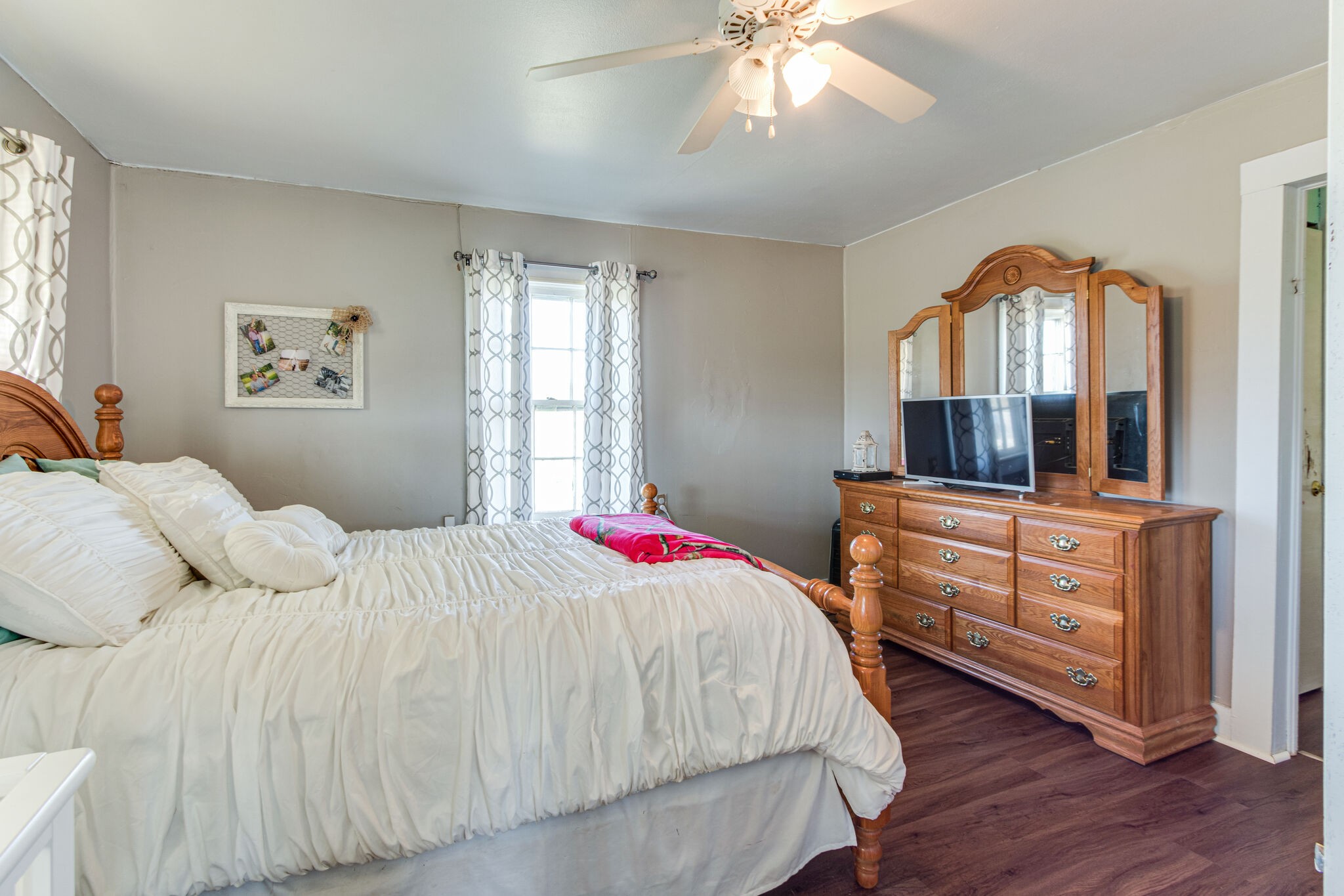 8026 Fredonia Road Manchester, TN 37355 - Photo 14 of 26 a bedroom with a bed and a dresser