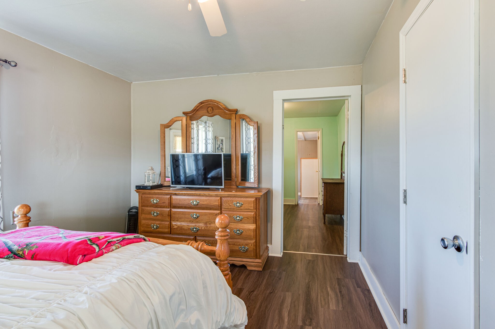 8026 Fredonia Road Manchester, TN 37355 - Photo 16 of 26 a bedroom with a bed and a dresser