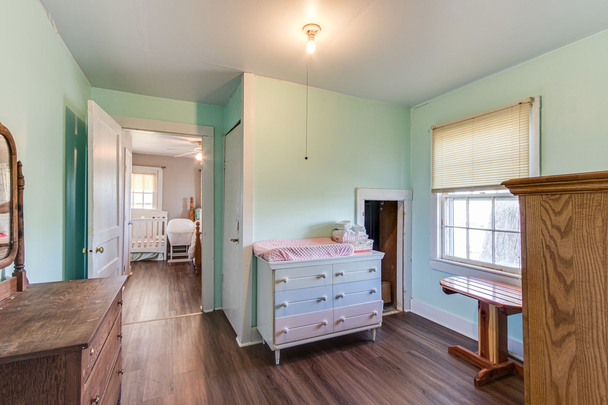 8026 Fredonia Road Manchester, TN 37355 - Photo 18 of 26 a bedroom with furniture and a wooden floor