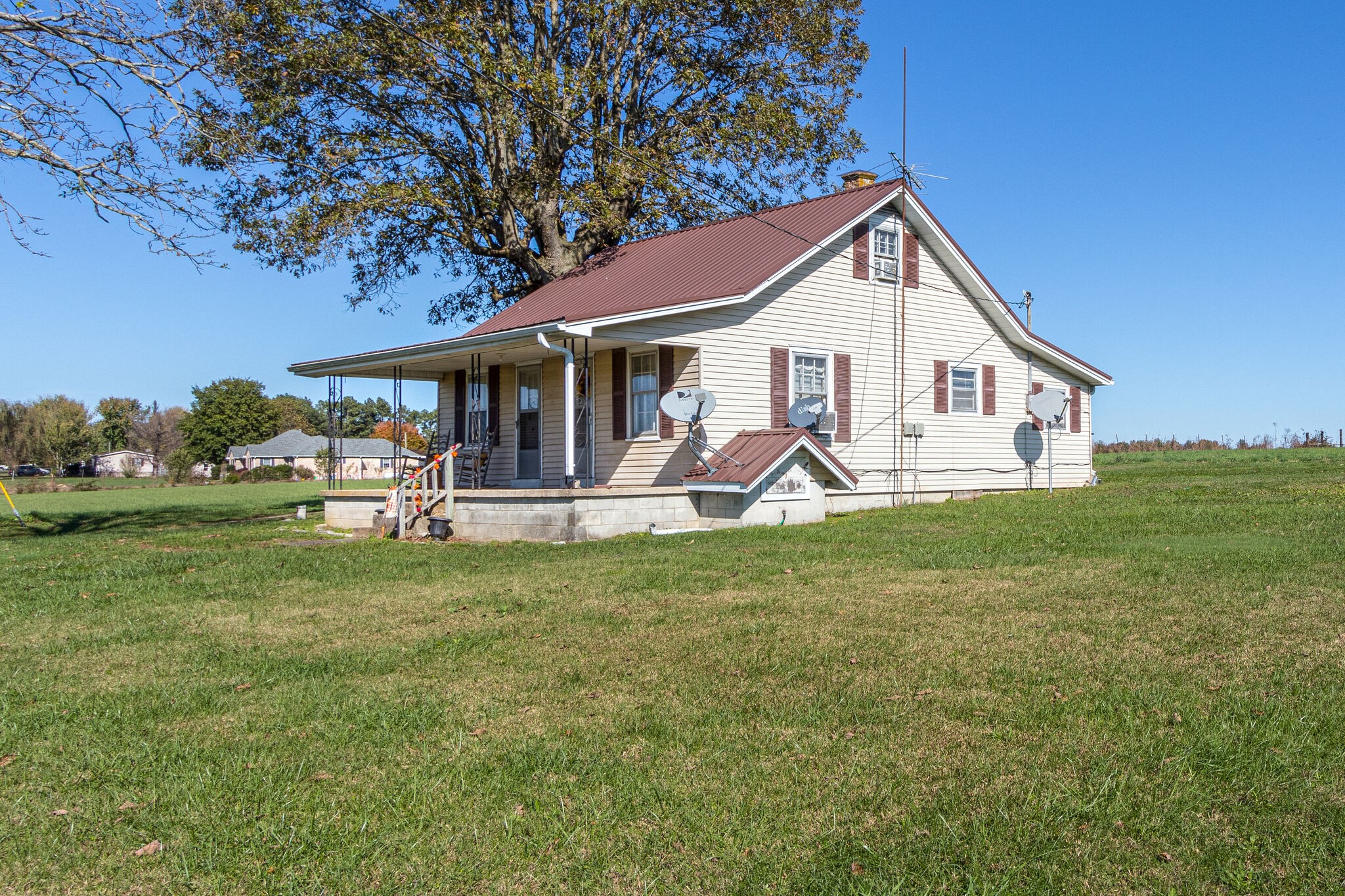 8026 Fredonia Road Manchester, TN 37355 - Photo 3 of 26 a view of a house with a yard porch and sitting area
