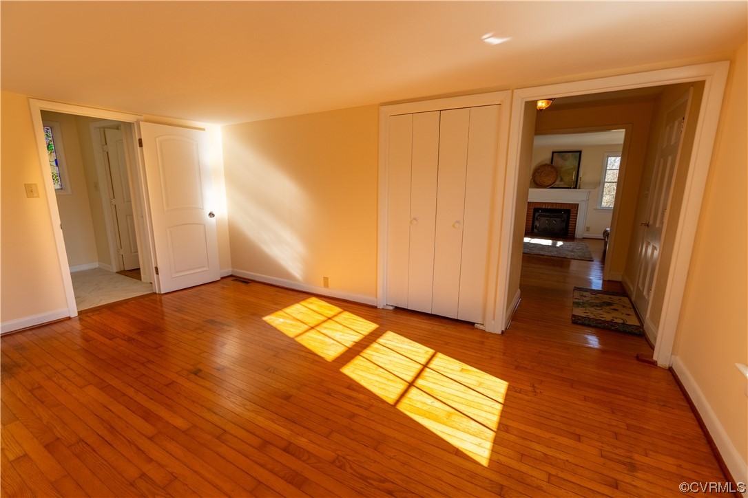 1431 Three Chopt Road Kents Store, VA 23084 - Photo 23 of 40 a view of empty room with wooden floor