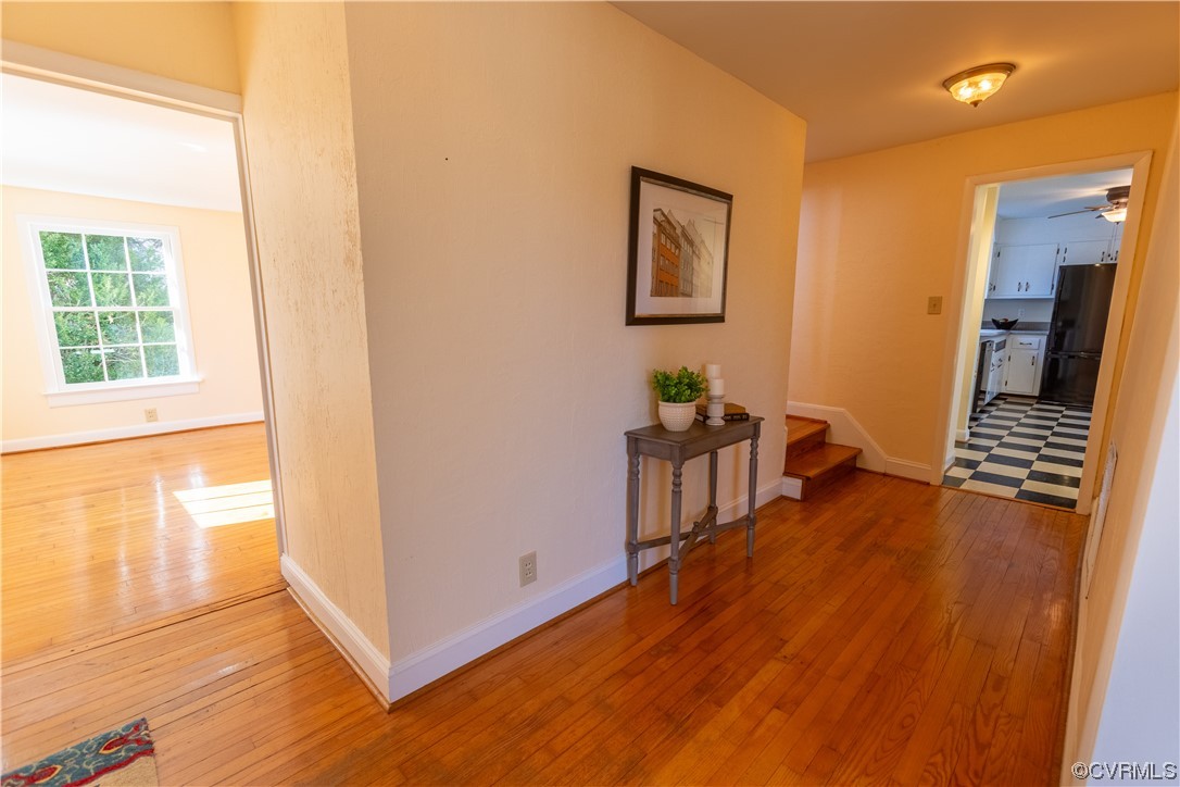 1431 Three Chopt Road Kents Store, VA 23084 - Photo 3 of 40 a view of a livingroom with wooden floor and a large window