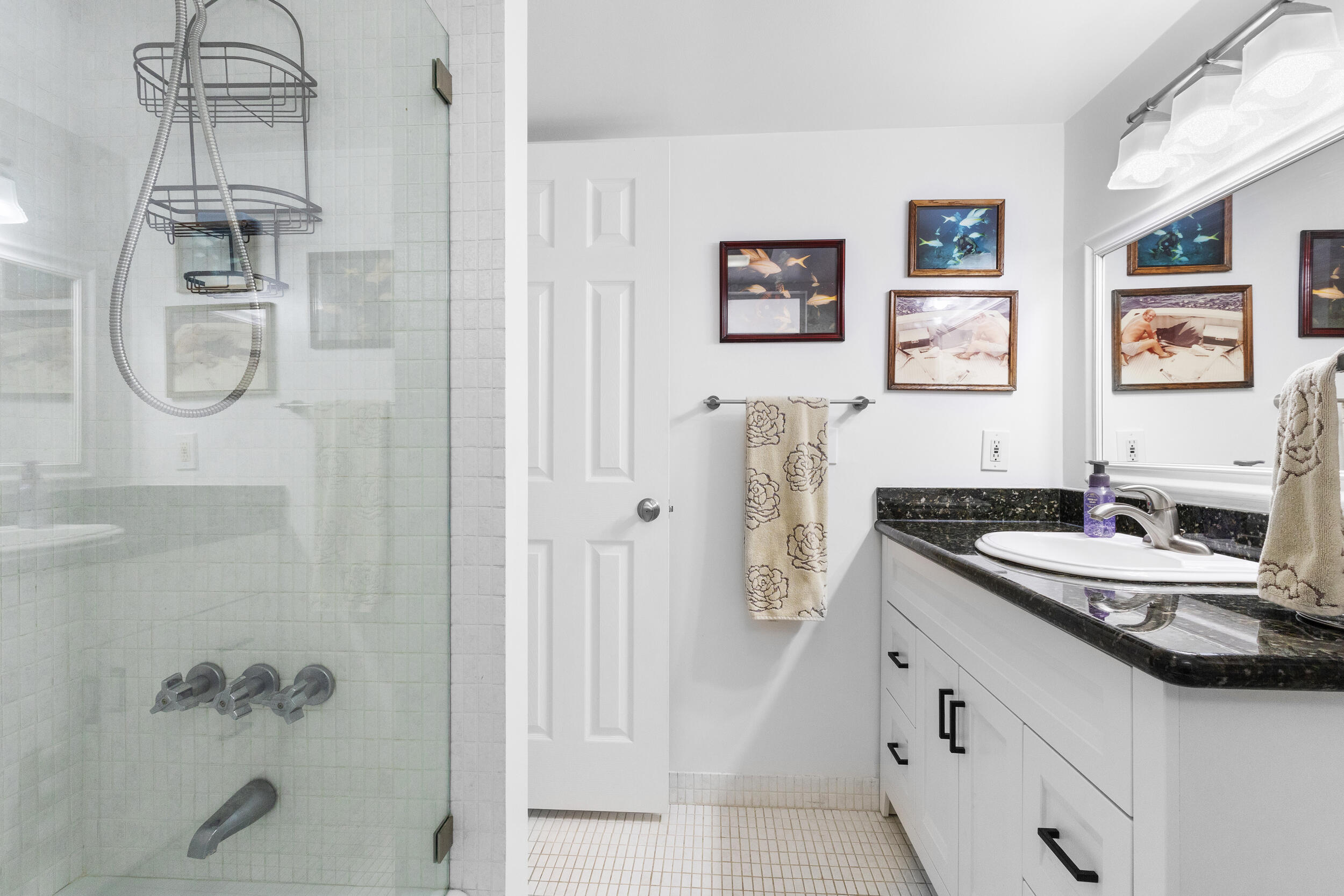 7 Colonial Club Drive, Unit 300 Boynton Beach, FL 33435 - Photo 15 of 24 a bathroom with a sink and a mirror