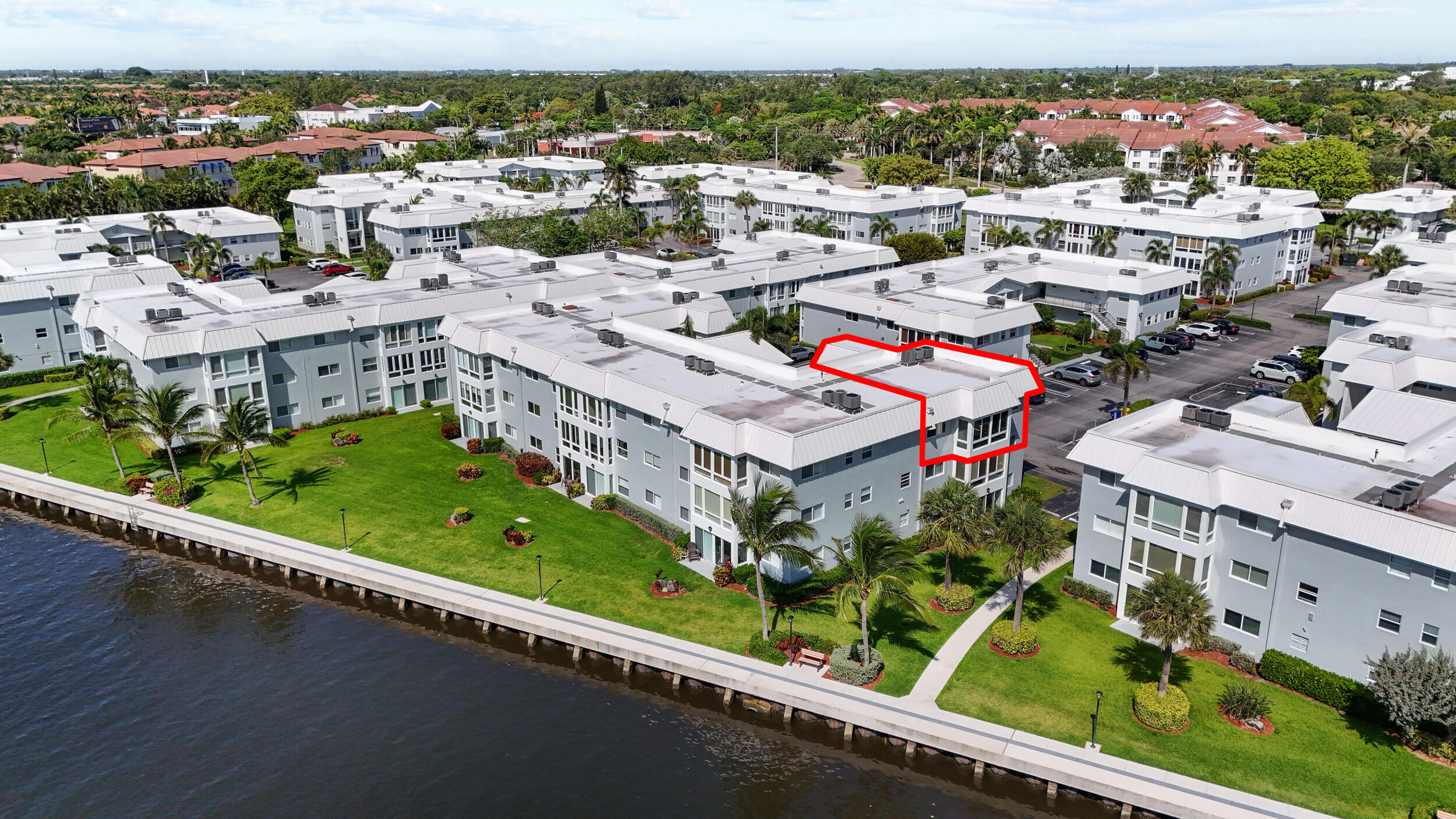 7 Colonial Club Drive, Unit 300 Boynton Beach, FL 33435 - Photo 16 of 24 an aerial view of a city