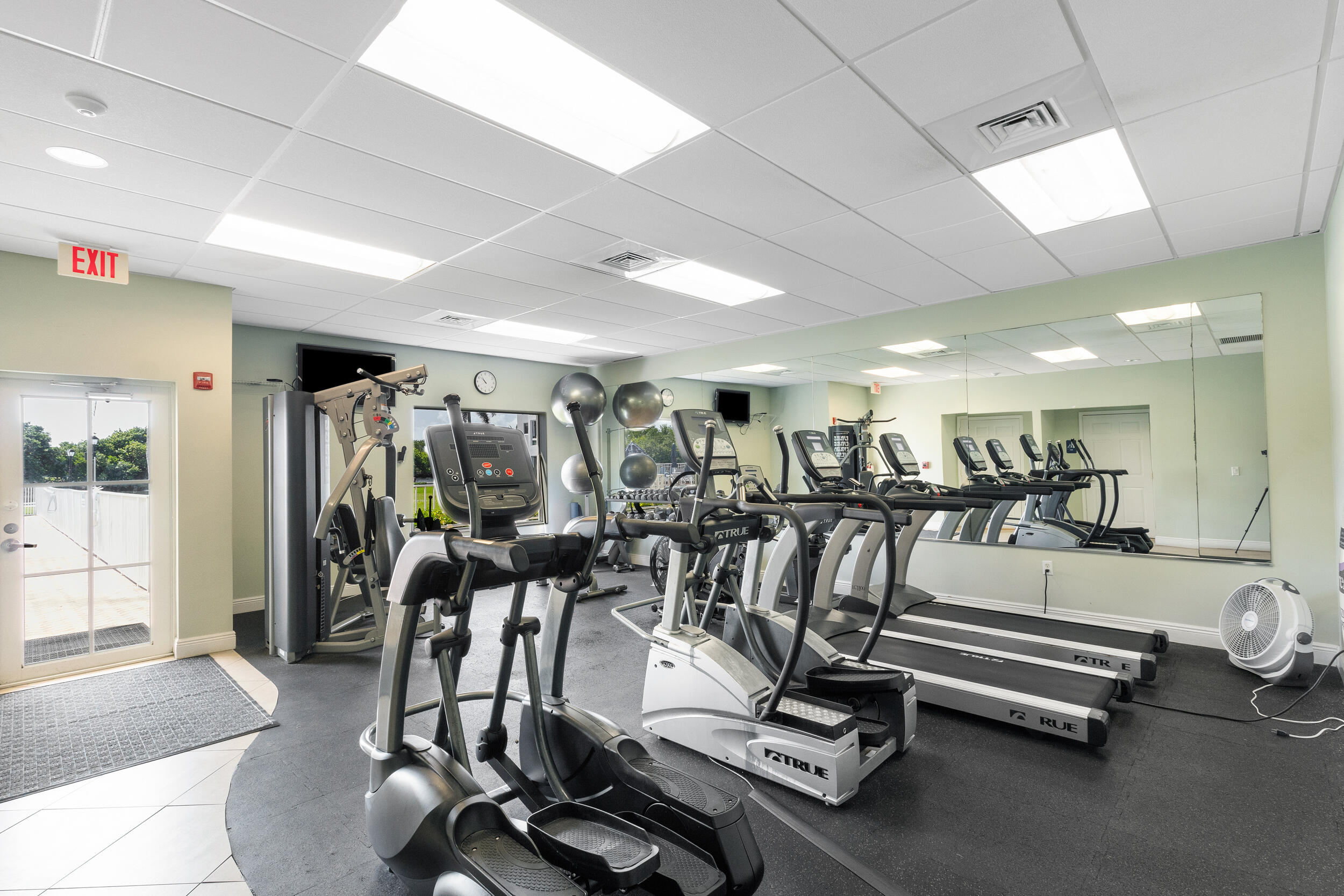 7 Colonial Club Drive, Unit 300 Boynton Beach, FL 33435 - Photo 22 of 24 a view of a room with gym equipment