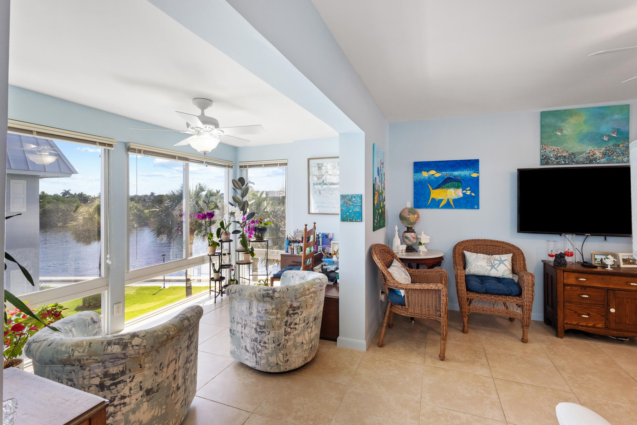 7 Colonial Club Drive, Unit 300 Boynton Beach, FL 33435 - Photo 7 of 24 a living room with furniture and a flat screen tv