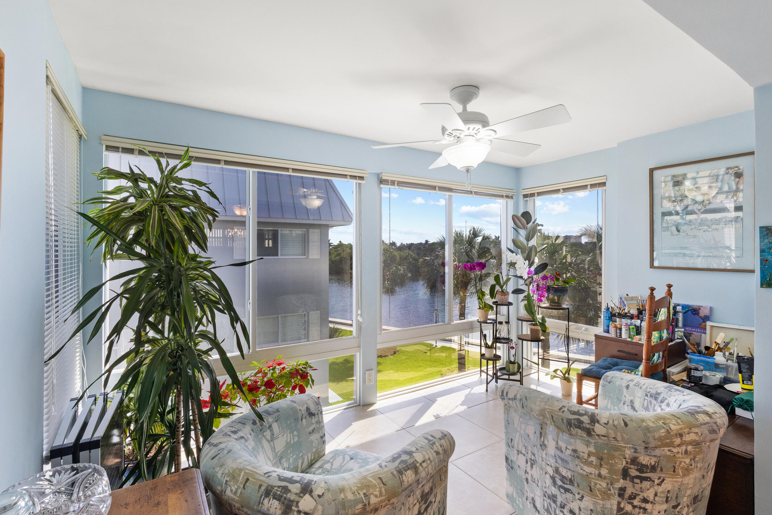 7 Colonial Club Drive, Unit 300 Boynton Beach, FL 33435 - Photo 8 of 24 a living room filled with furniture and a potted plant