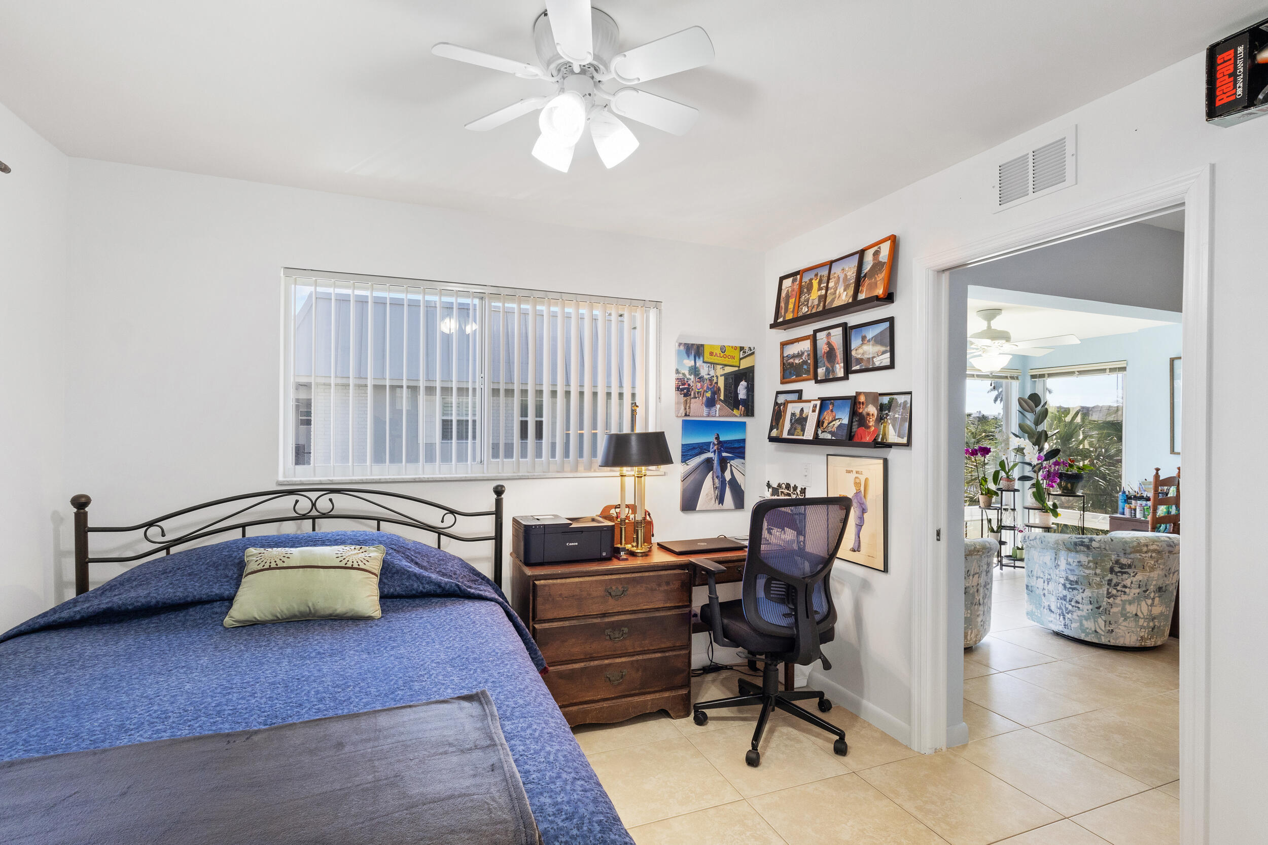 7 Colonial Club Drive, Unit 300 Boynton Beach, FL 33435 - Photo 9 of 24 a workspace with furniture and window