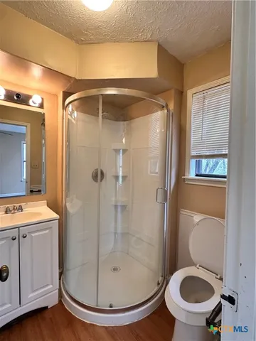 a bathroom with a toilet and a sink