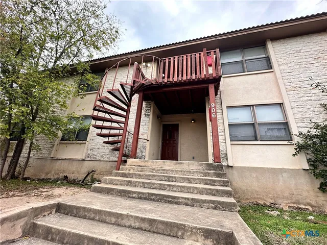 a view of a house with a balcony