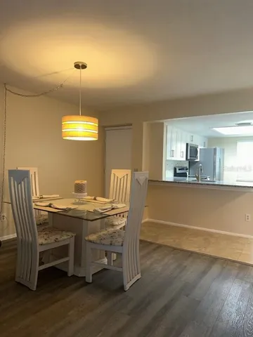 a view of a dining room with furniture