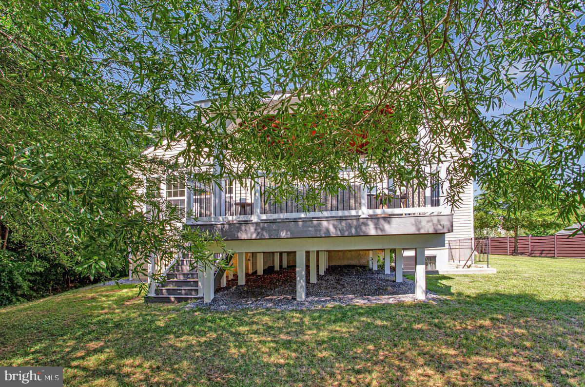 8704 Alexa Road Clinton, MD 20735 - Photo 39 of 42 Large deck overlooking the green backyard