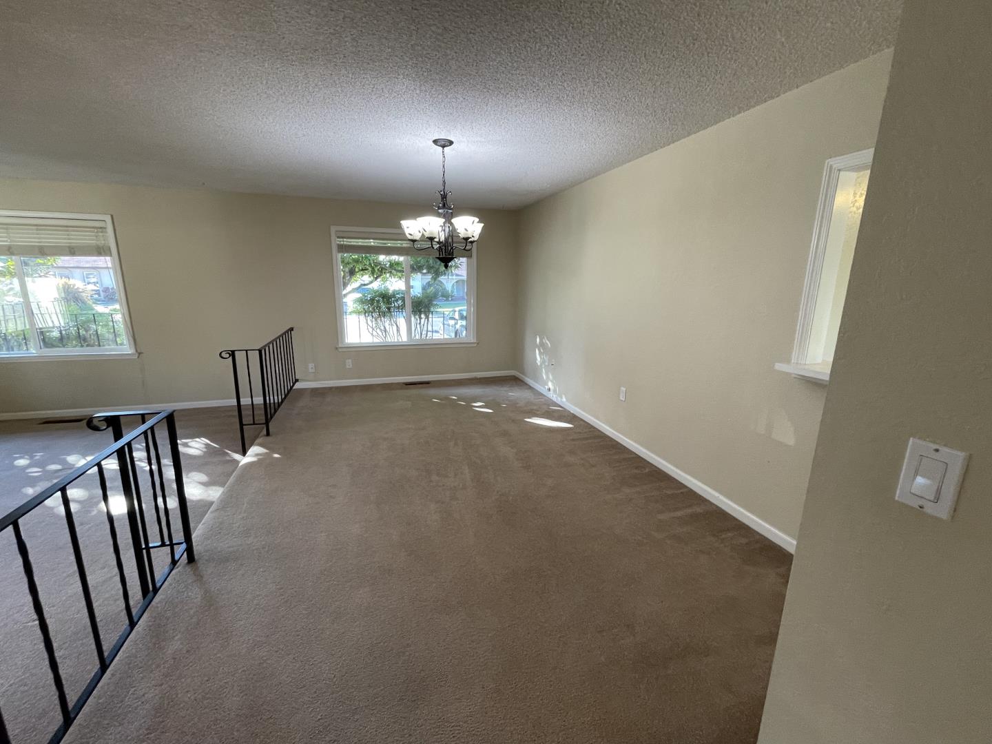 5732 Davis Circle Rohnert Park, CA 94928 - Photo 3 of 14 an empty room with windows and stairs