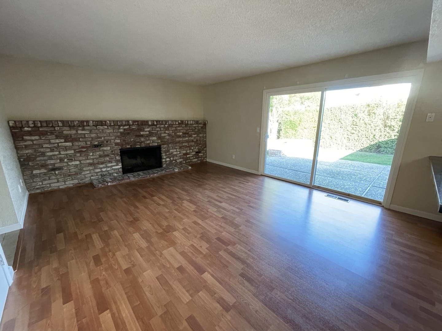 5732 Davis Circle Rohnert Park, CA 94928 - Photo 5 of 14 a view of an empty room with wooden floor and a window