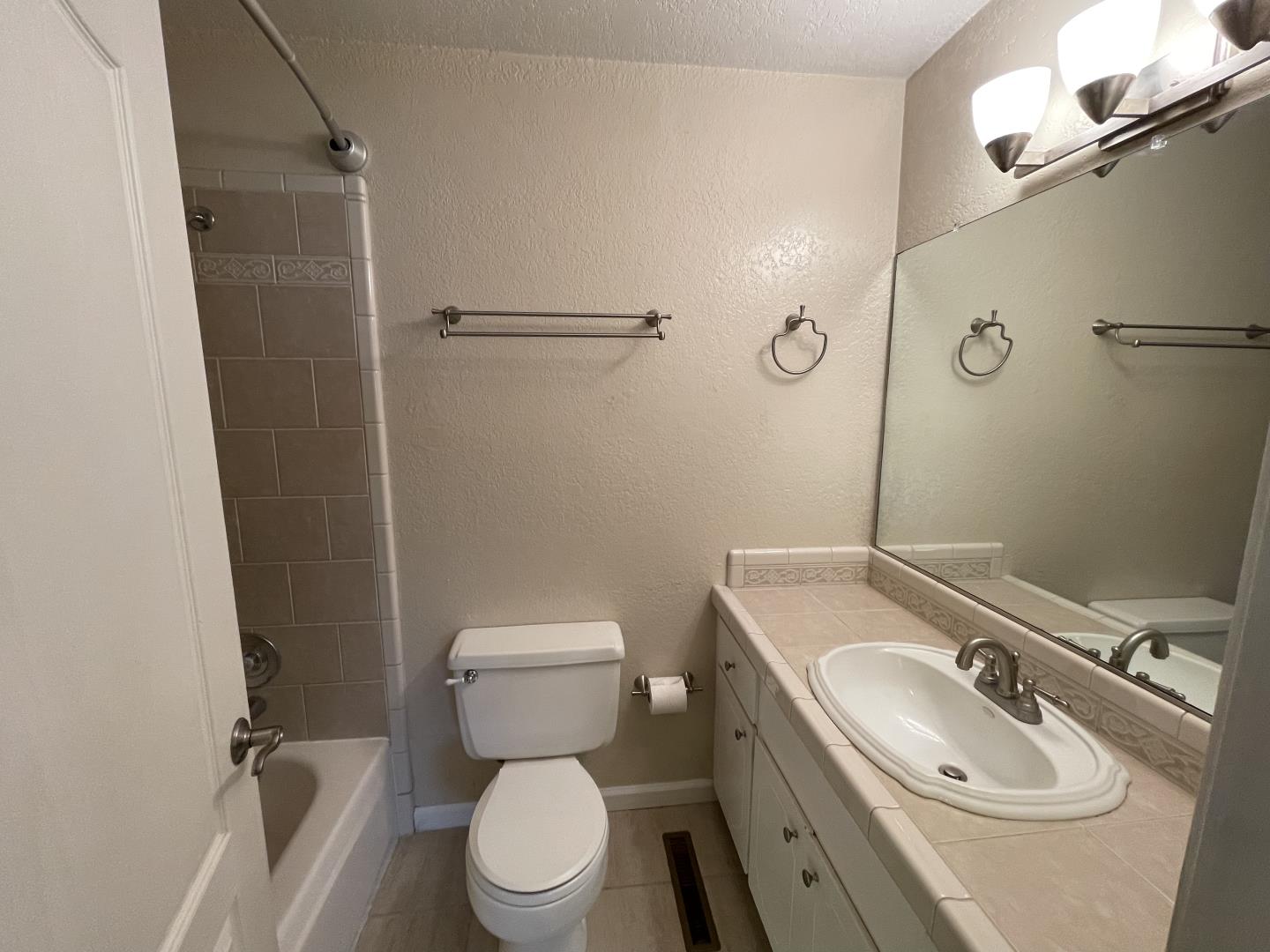 5732 Davis Circle Rohnert Park, CA 94928 - Photo 7 of 14 a bathroom with a sink toilet and shower