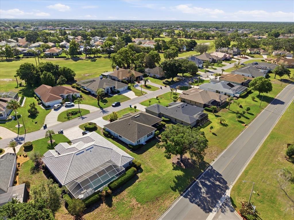 9311 Butler Boulevard Weeki Wachee, FL 34613 - Photo 12 of 60 an aerial view of residential houses with outdoor space