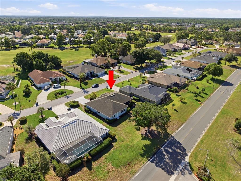 9311 Butler Boulevard Weeki Wachee, FL 34613 - Photo 13 of 60 an aerial view of a houses with a swimming pool