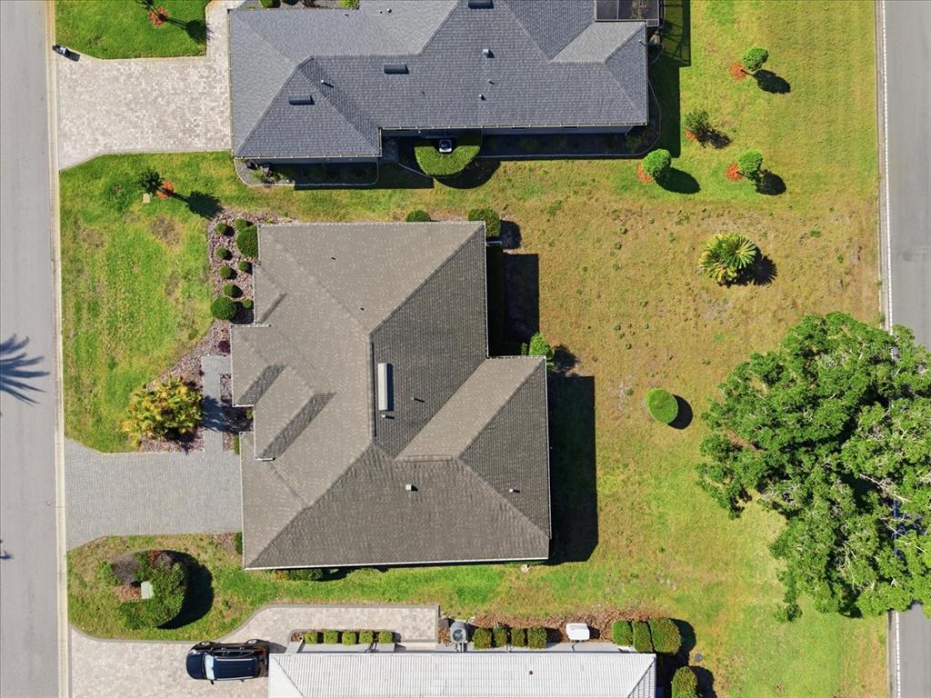 9311 Butler Boulevard Weeki Wachee, FL 34613 - Photo 14 of 60 an aerial view of a house with a yard