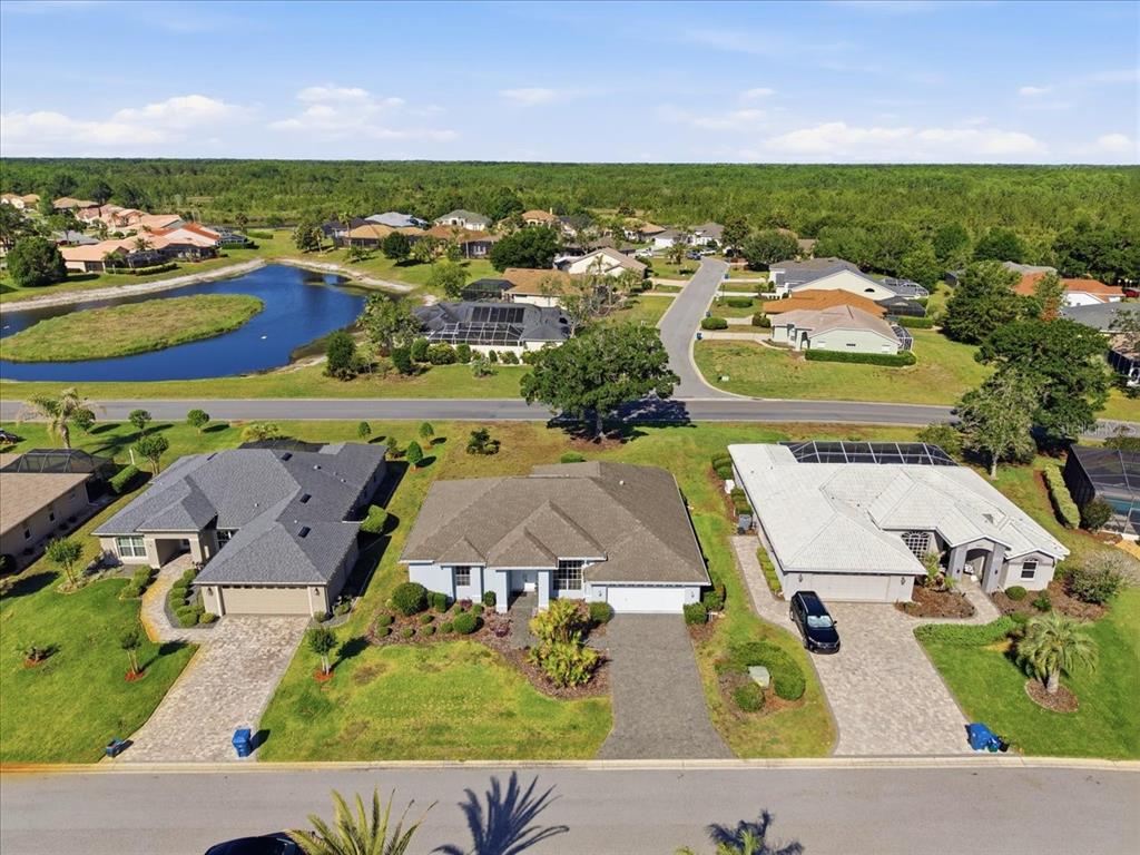 9311 Butler Boulevard Weeki Wachee, FL 34613 - Photo 3 of 60 an aerial view of residential houses with outdoor space