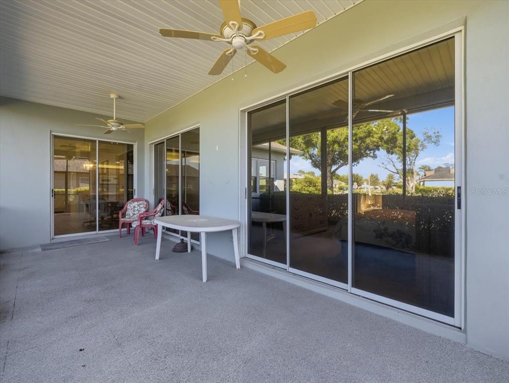 9311 Butler Boulevard Weeki Wachee, FL 34613 - Photo 57 of 60 a view of a room with gym equipment and a large window