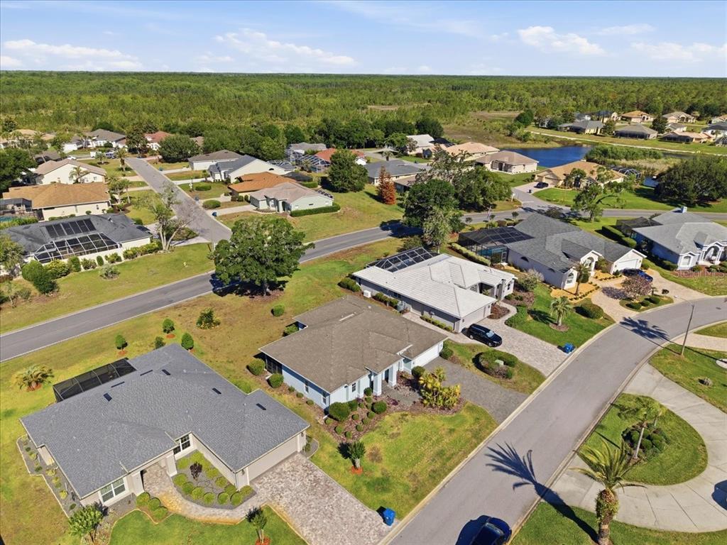 9311 Butler Boulevard Weeki Wachee, FL 34613 - Photo 6 of 60 an aerial view of residential houses with outdoor space