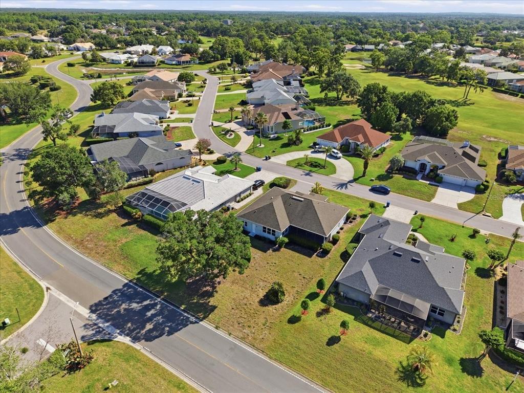 9311 Butler Boulevard Weeki Wachee, FL 34613 - Photo 8 of 60 an aerial view of residential houses with outdoor space
