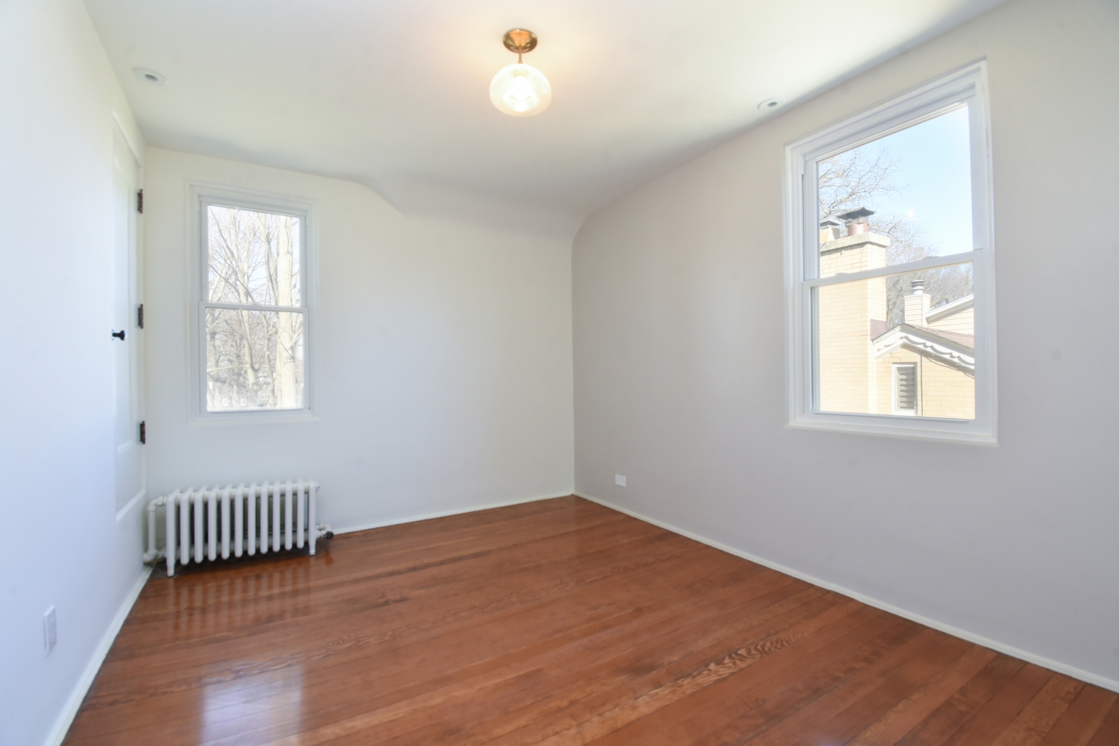 427 Uvedale Road Riverside, IL 60546 - Photo 19 of 33 an empty room with a window
