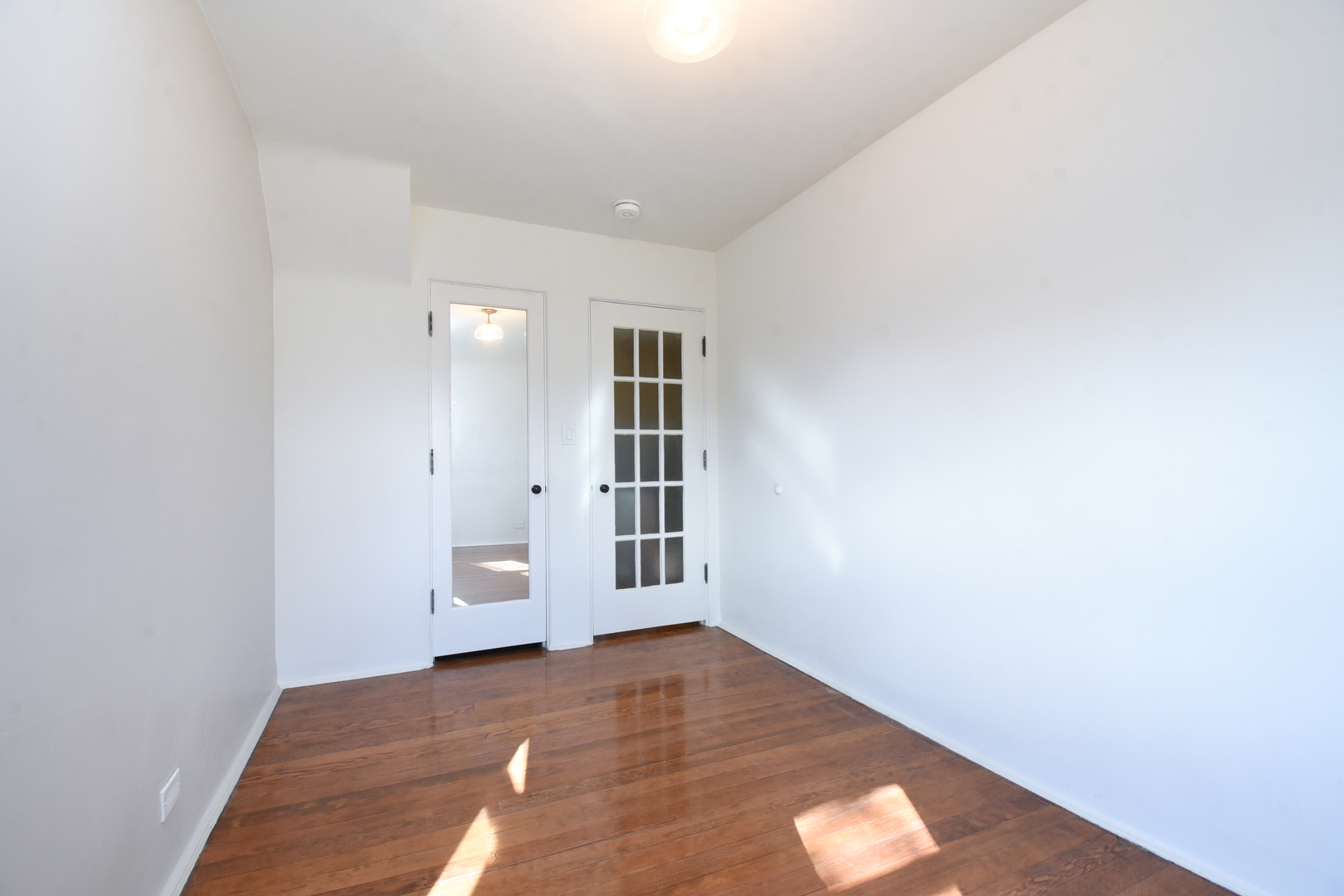 427 Uvedale Road Riverside, IL 60546 - Photo 20 of 33 a view of an empty room with a window