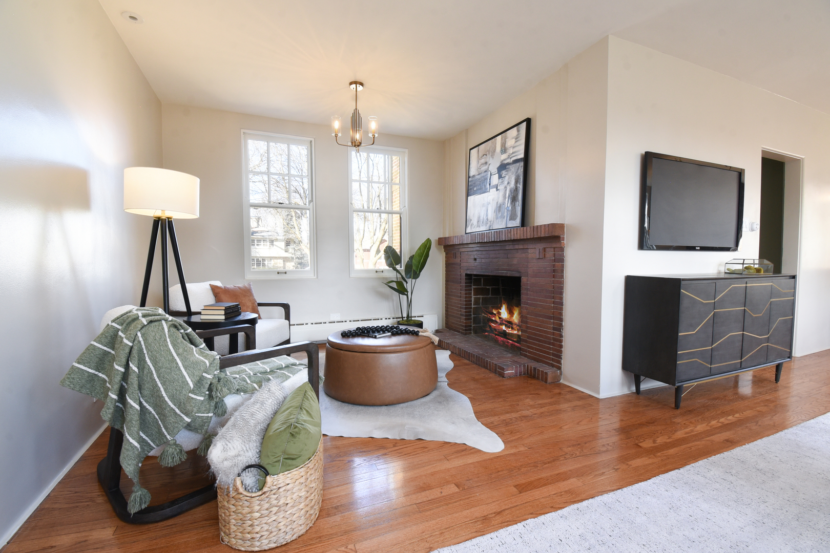 427 Uvedale Road Riverside, IL 60546 - Photo 5 of 33 a living room with furniture a window and a fireplace