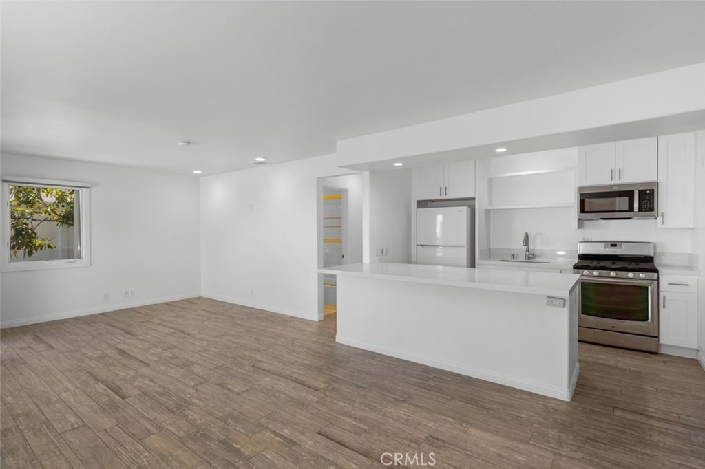 33941 Granada Drive Dana Point, CA 92629 - Photo 13 of 61 a view of kitchen with granite countertop stainless steel appliances stove sink and refrigerator
