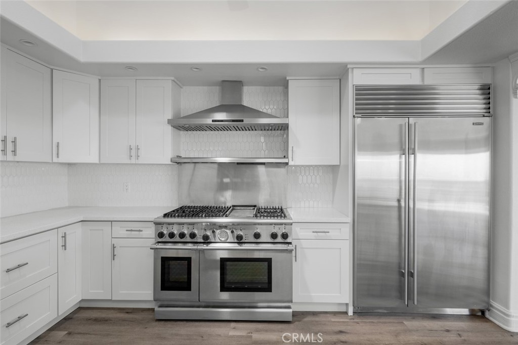 33941 Granada Drive Dana Point, CA 92629 - Photo 18 of 61 a stove top oven sitting inside of a kitchen