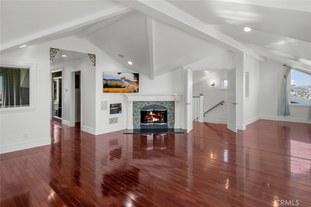 33941 Granada Drive Dana Point, CA 92629 - Photo 28 of 61 a view of livingroom with furniture and fireplace