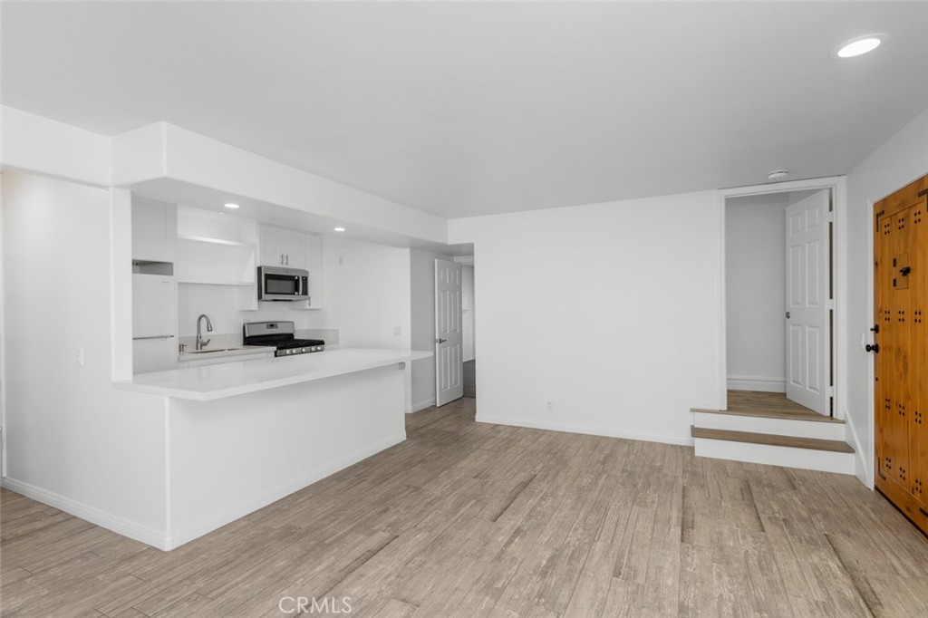 33941 Granada Drive Dana Point, CA 92629 - Photo 41 of 61 a kitchen with stainless steel appliances a refrigerator and a stove top oven