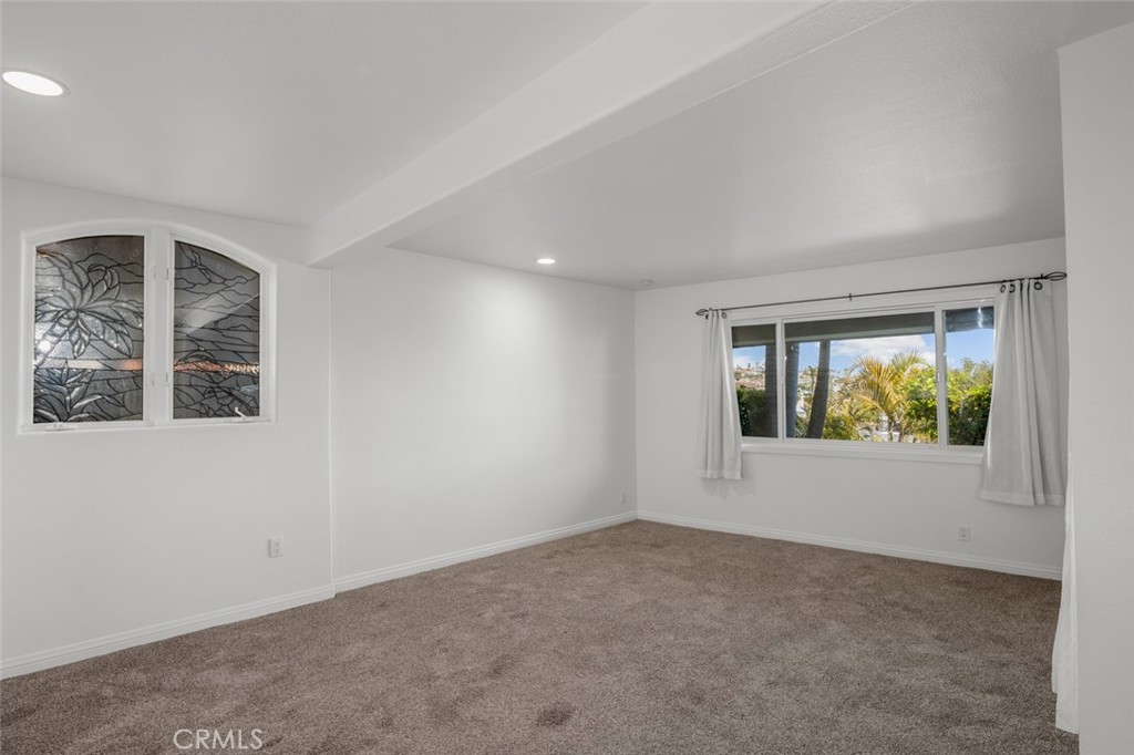 33941 Granada Drive Dana Point, CA 92629 - Photo 44 of 61 an empty room with windows