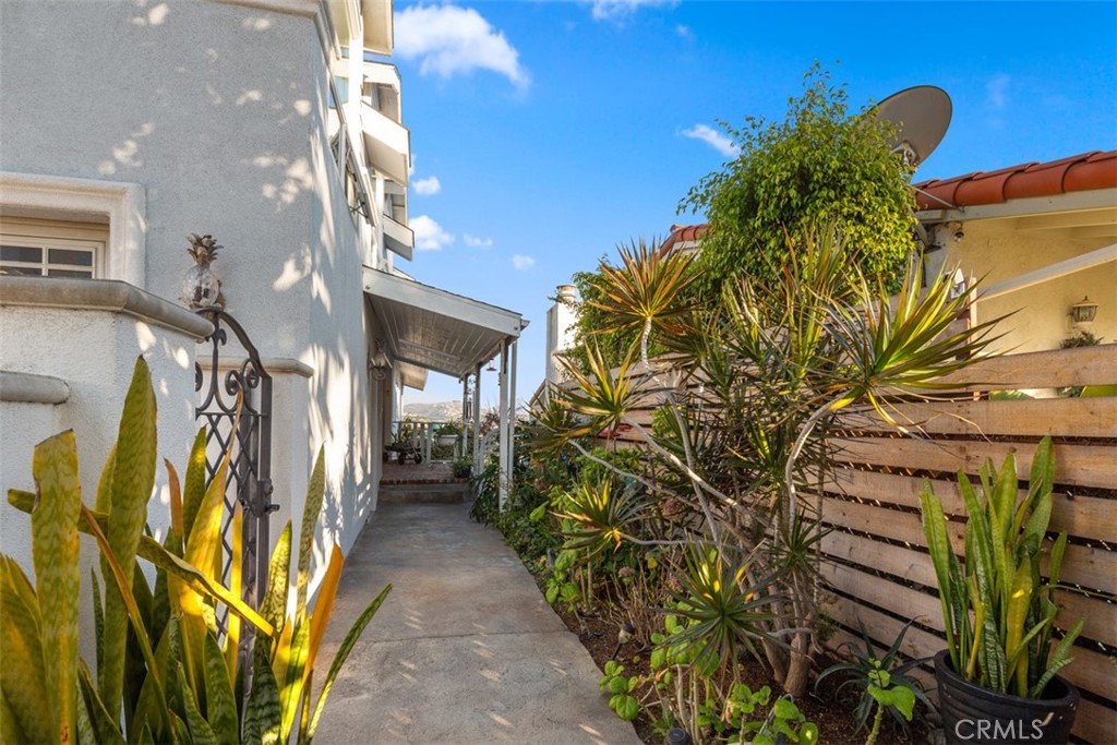 33941 Granada Drive Dana Point, CA 92629 - Photo 58 of 61 a view of a house with a flower garden