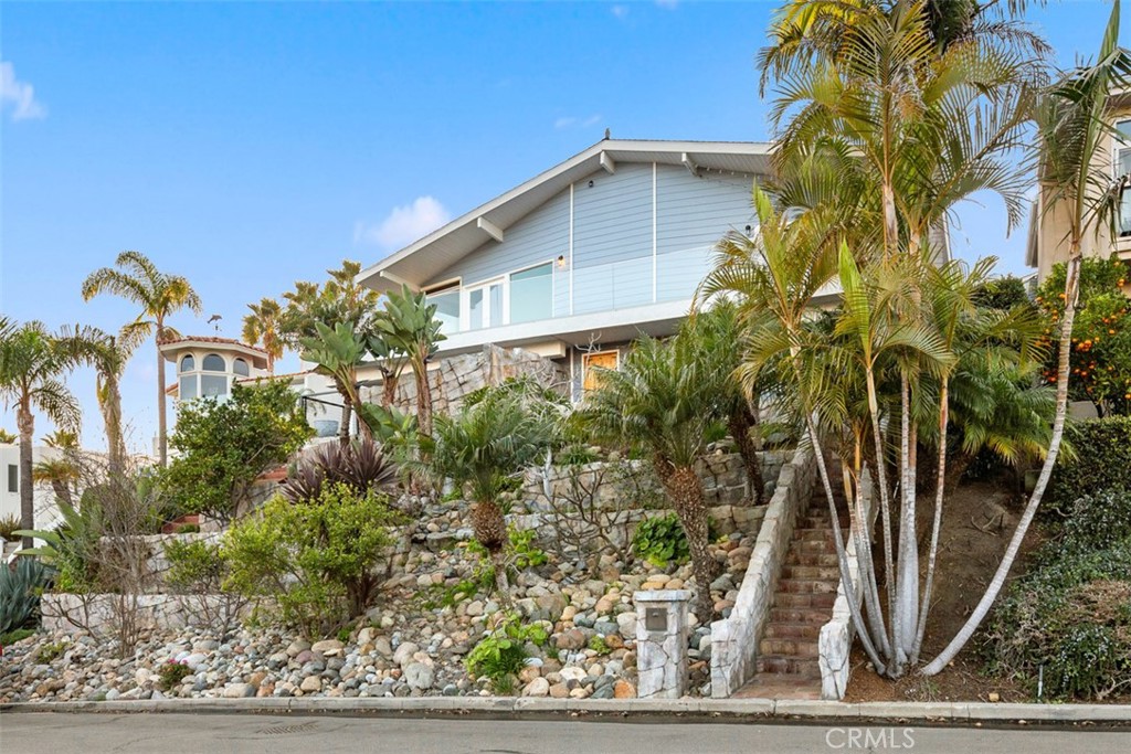 33941 Granada Drive Dana Point, CA 92629 - Photo 60 of 61 a front view of a house with a yard