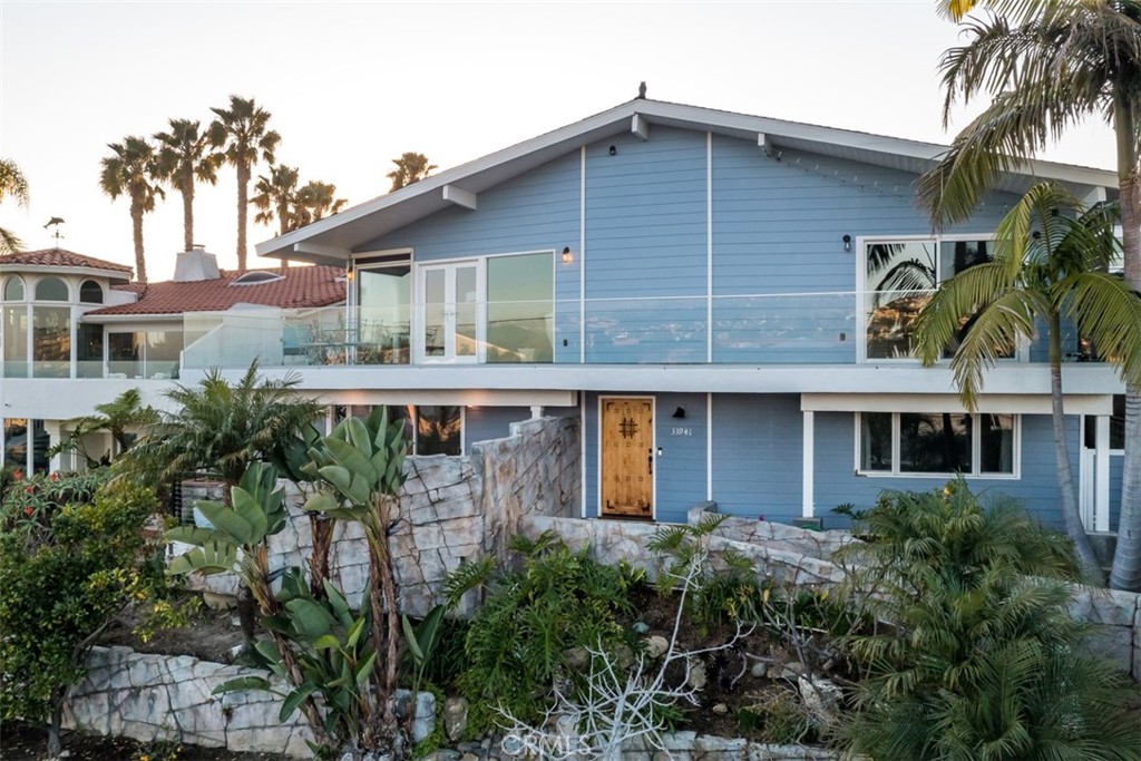 33941 Granada Drive Dana Point, CA 92629 - Photo 7 of 61 a front view of a house with a garden
