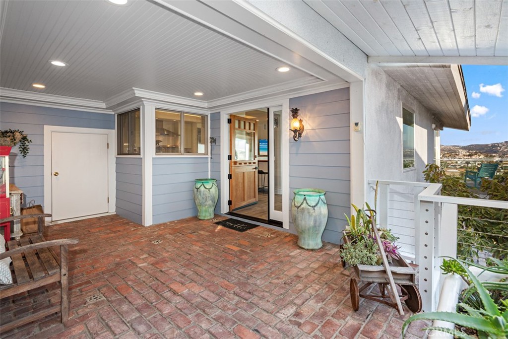 33941 Granada Drive Dana Point, CA 92629 - Photo 8 of 61 a view of an entryway with wooden floor and seating space